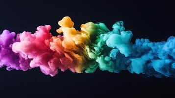 Brightly colored smoke in shades of red, orange, yellow, green, blue, and purple swirls elegantly on a dark backdrop, creating an eye-catching abstract composition filled with energy and movement photo