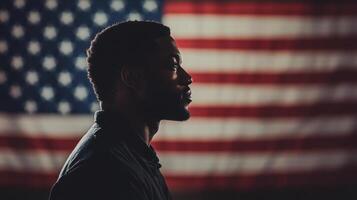 A man in front of an american flag photo
