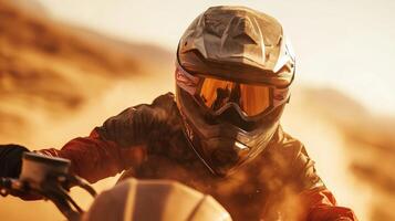 A person riding a dirt bike on a desert photo