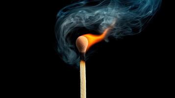 A matchstick with smoke coming out of it photo