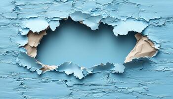 A hole in the wall with blue paint photo