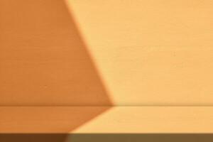 Concrete Table with Light Beam and Shadow on Wall Background in Light Orange photo