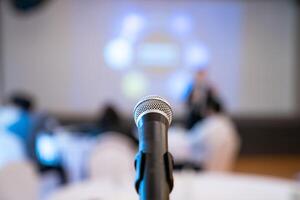 microphone is on microphone stand in seminar meeting room for everyone to use when speaking photo