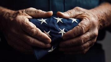 Hands holding an american flag photo