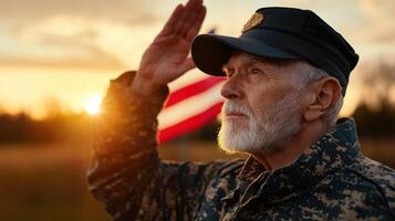 An older man saluting in front of an american flag photo