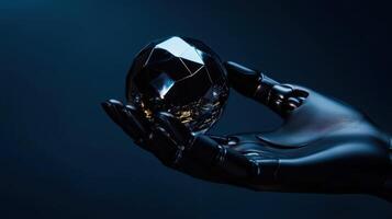 A hand holding a black diamond on a dark background photo