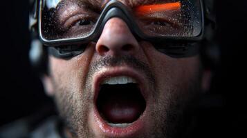 A man with goggles on his face is yelling photo