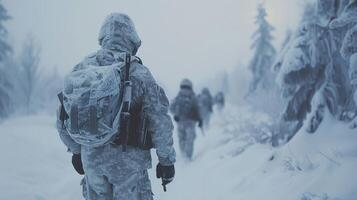 A group of soldiers navigates through a frozen terrain covered in snow, showcasing their training efforts and perseverance in harsh winter conditions. photo
