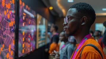 Attendees observe dynamic digital displays showcasing technology at an innovation expo. The atmosphere buzzes with curiosity and learning in an urban setting. photo