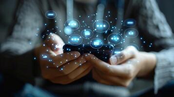 Hands interact with a smartphone displaying various digital communication icons, symbolizing interaction and engagement with technology in a relaxed indoor environment. photo