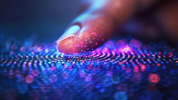 A finger gently touches a digital surface illuminated with colorful lights, creating an intricate pattern of dynamic, glowing dots. The scene showcases advanced technology. photo