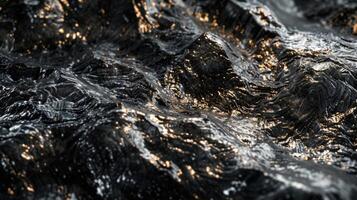 Dark waves ripple across the surface, catching shimmering light from various angles. The intricate textures create a mesmerizing visual effect that captivates the viewer's attention. photo