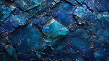 This blue stone surface features striking patterns and deep hues, creating a stunning visual effect enhanced by the interplay of light and shadow across its texture. photo