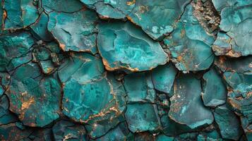 Textured surface of cracked turquoise stone showcases a beautiful array of colors and patterns, highlighting the natural beauty and complexity of geological formations. photo