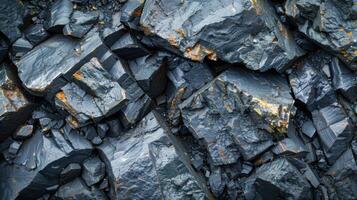 This view highlights various rock formations with intricate textures and colors under natural light, revealing layers and mineral deposits in the geological landscape. photo