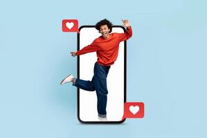 A person joyfully interacts with a smartphone, symbolizing modern communication. The collage features heart icons, representing love and connection on social media platforms. photo