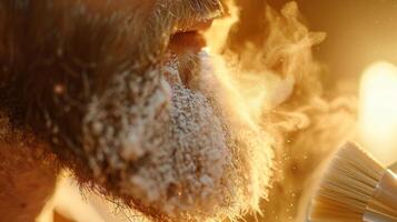 A man engages in a grooming session at sunrise. Steam rises gently from his frosted beard as he prepares with a brush, illuminated by warm sunlight. photo