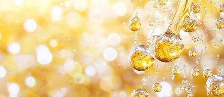 Bubbles in golden liquid with a soft, blurred background. photo