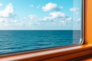 A serene ocean view through a window, showcasing a peaceful sky. photo