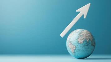 Global Economic Growth Concept with Upward Arrow on Globe Against Blue Background photo
