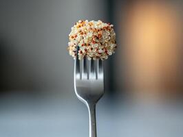 Close-Up of Quinoa on Fork with Blurred Background - Healthy Food Concept photo