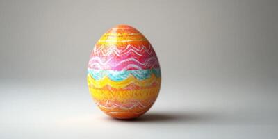Colorful Easter egg displays intricate patterns in bright hues on a neutral background photo
