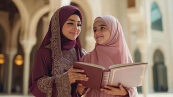 Muslim Mother and Daughter Reading Religious Book Together photo