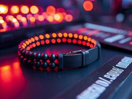 Close up shot showcases stylish wristband designed for customization lying flat next concert tickets. setting highlights vibrant details and craftsmanship photo