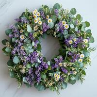 stunning circular spring wreath features vibrant lavender eucalyptus leaves and delicate daisies photo