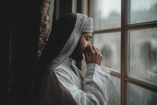 man prepares for Friday prayers adjusting his ghutra and black agal while looking into mirror. moment captures anticipation and reverence in personal and meaningful setting photo