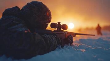 Silhouetted against dawn light biathlete prepares their rifle amidst thick fog on snow covered terrain. quiet atmosphere embodies focus and determination in training photo