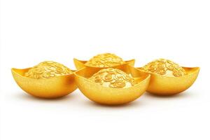 Four ornate golden ingots arranged elegantly, symbolizing wealth and prosperity. photo