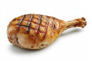 Grilled chicken leg with a juicy, golden-brown exterior, showcasing appetizing grill marks. photo