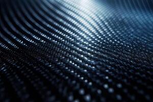 Abstract close-up of a textured surface in dark tones, showcasing intricate patterns and light reflections. photo