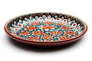 A beautifully crafted decorative plate featuring vibrant floral patterns in red, blue, and white tones. photo