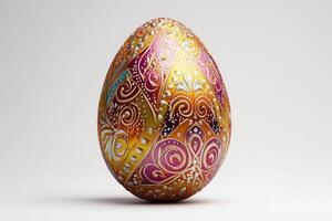 A beautifully decorated egg with intricate patterns in vibrant colors, showcasing artistry and craftsmanship. photo