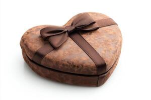 A heart-shaped gift box in rich brown tones with a stylish ribbon, perfect for romantic occasions. photo