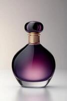 Elegant glass perfume bottle with a gradient of purple hues, featuring a round stopper and a sophisticated design. photo
