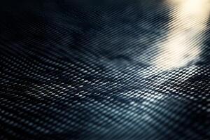 Abstract texture of a dark, reflective surface with intricate patterns. photo