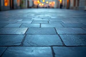 Close-up view of cobblestone pavement in a softly lit alley, creating a tranquil and inviting atmosphere. photo