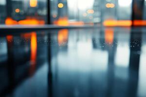 An abstract view capturing droplets on a glossy surface, with warm orange hues reflecting in a modern indoor setting. photo