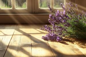 A bouquet of fresh lavender rests on a sunlit wooden floor, casting soft shadows in a tranquil setting. photo