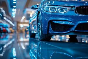 Close-up of a sleek blue sports car showcasing its angular design and shining reflections in a modern showroom. photo