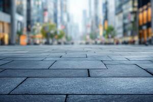 A serene view of a city street with modern buildings, captured from a low perspective, showcasing detailed pavement patterns. photo