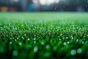 Dew-covered artificial grass glistens in the rain, creating a vibrant green landscape. photo