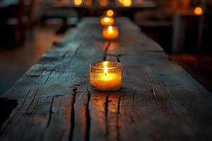 A serene setting with flickering candles on a rustic wooden table, creating a warm and inviting ambiance. photo