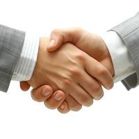 A close-up of two hands engaged in a professional handshake, symbolizing agreement and collaboration. photo