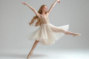 A graceful young Caucasian ballet dancer performs an elegant leap in a flowing ivory dress, showcasing her passion and poise. photo
