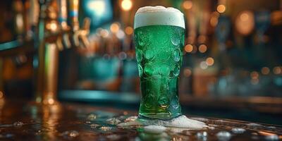 A refreshing glass of green beer with a frothy head, sitting on a bar top, capturing the festive spirit. photo