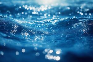 Close-up of shimmering blue ocean waves reflecting sunlight, creating a serene and tranquil atmosphere. photo